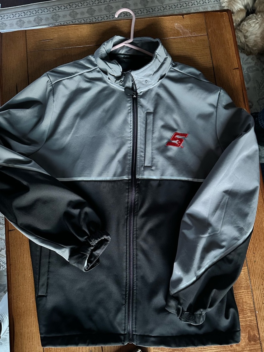 Snap branded black fleece jacket with gray logo